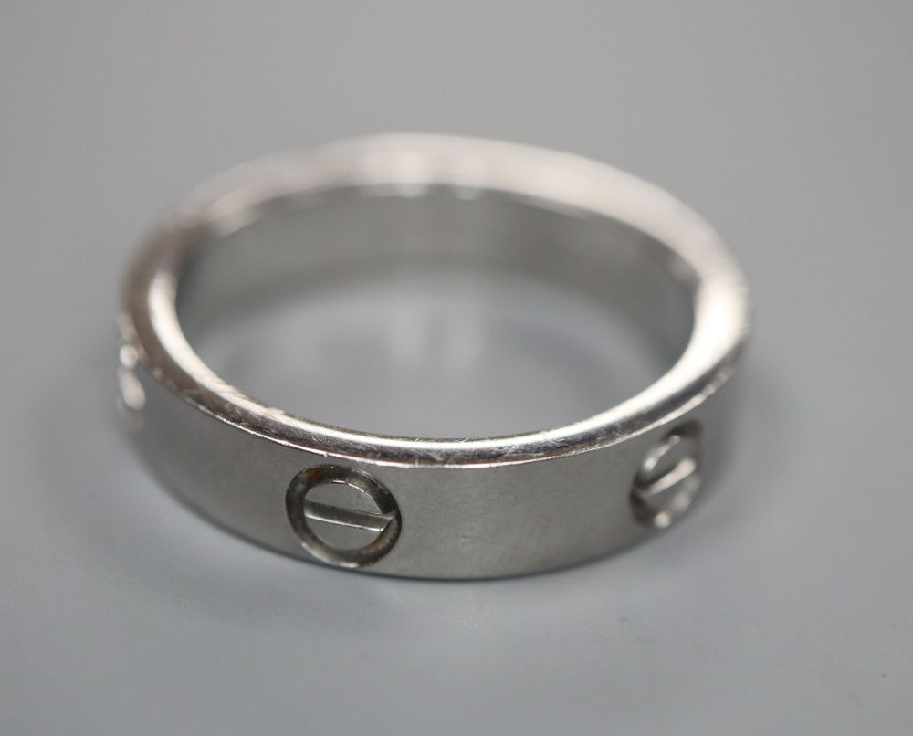 A Cartier 750 white metal Love ring, numbered 52833A, size 3.8 grams.